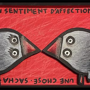 Deux oiseaux stylisés face à face en bois découpé sur fond rouge avec texte manuscrit, série Boîtes
